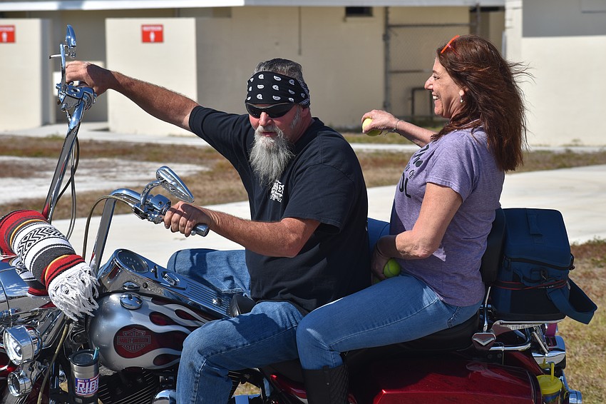 Casey Lynch and Christina Primiano go for a spin during the Biker Rodeo Games.