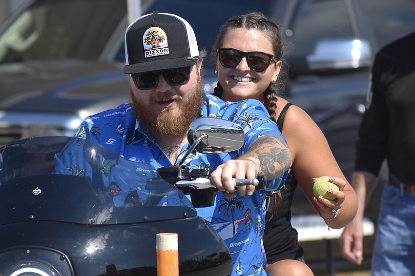 Andrew Spencer and Avery Clarke head out on a challenge to place tennis balls on top of poles in the Biker Rodeo Games.