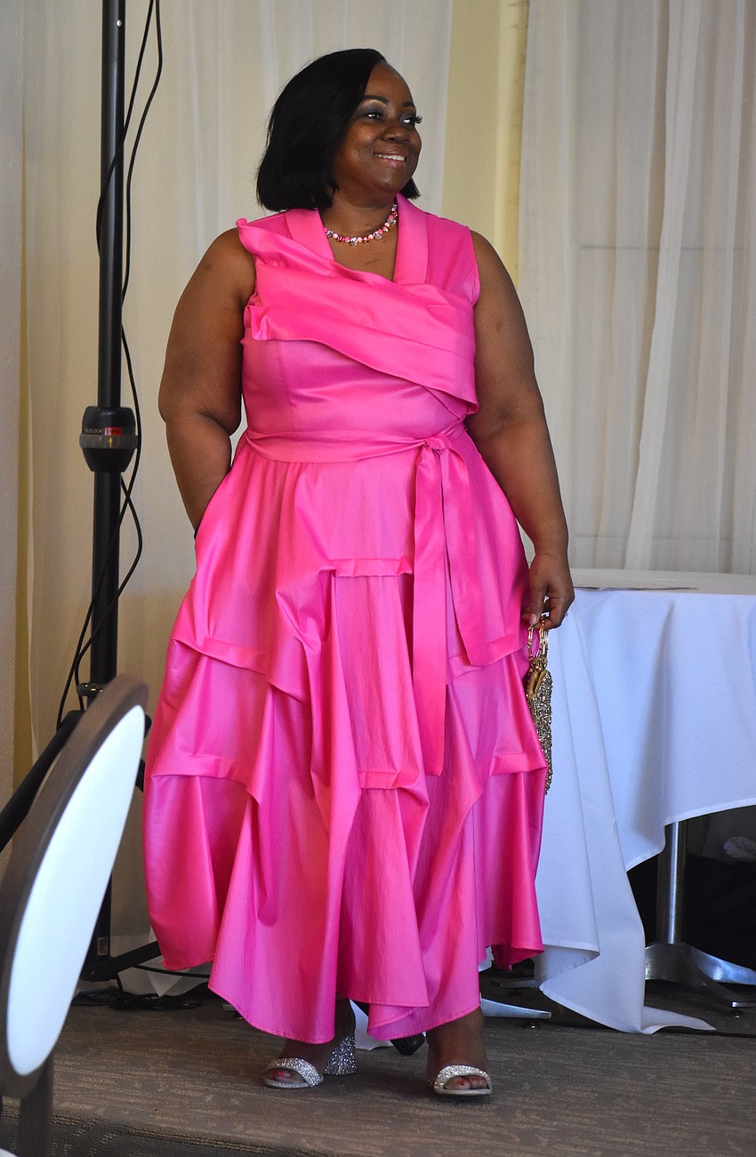 Rhonda Calahan, the founder of Queens of Domestic Violence Awareness, is one of the models in the Passion for Fashion show. Her organization is one of the charities the Palm Aire Women's Club has shown support for.