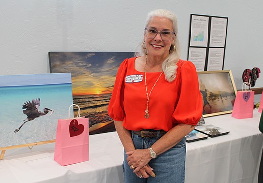 Artist Jonell Yoekel showcases her nature photography at the Women's Guild Valentine's Day-themed art show on Feb. 10 at St. Mary, Star of the Sea, Catholic Church.