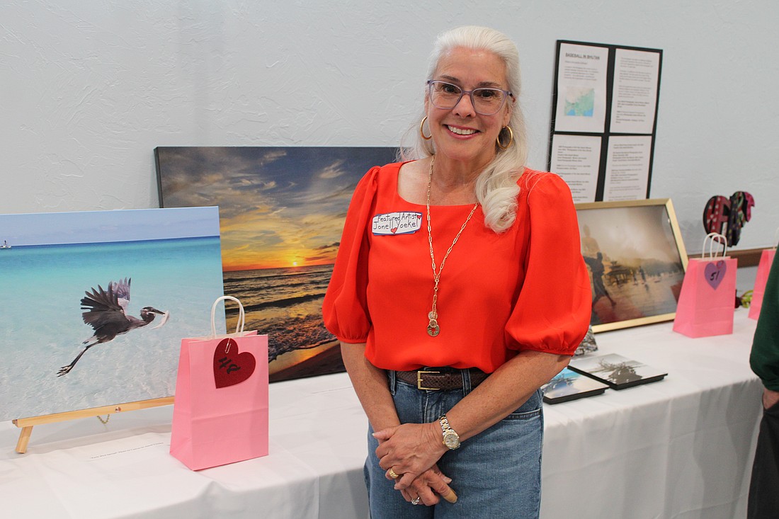 Artist Jonell Yoekel showcases her nature photography at the Women's Guild Valentine's Day-themed art show on Feb. 10 at St. Mary, Star of the Sea, Catholic Church.