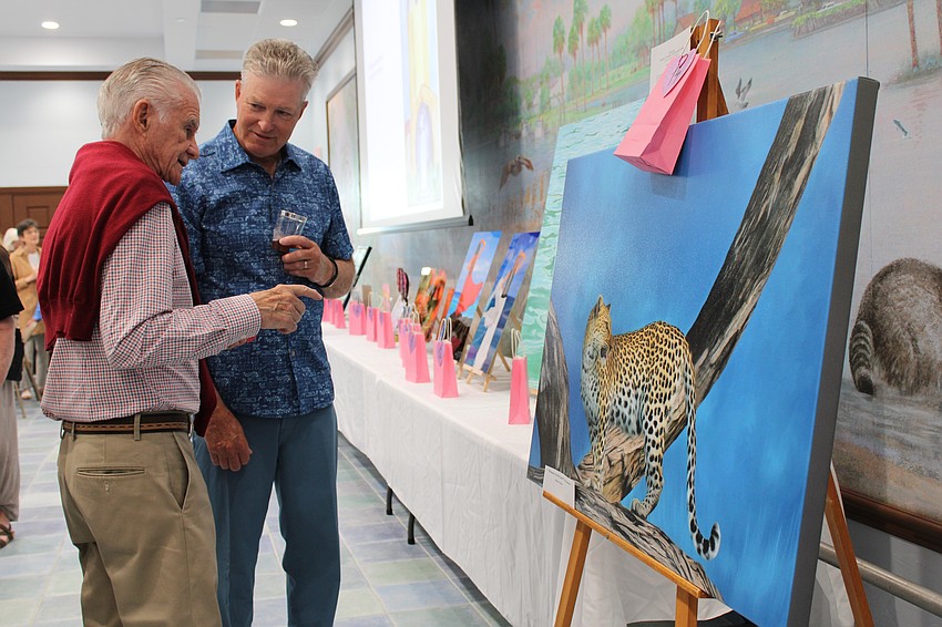 Frank Toomey, husband of Women's Guild President Kay Kochenderfer, shares with Brent Leonard the behind-the-scenes story of his wife's photography adventures in Botswana.