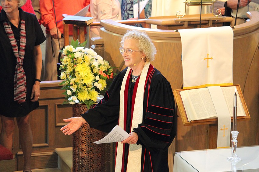 Christ Church of Longboat Key Rev. Julia Piermont invites community members up to the stage for Choirpalooza.