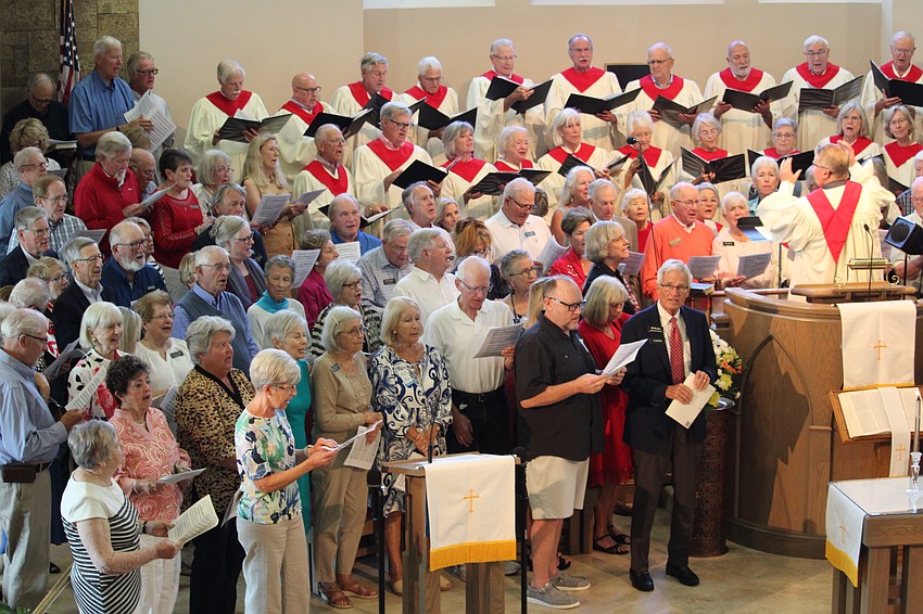Choir members did as bidden by Rev. Julia Piermont and 
