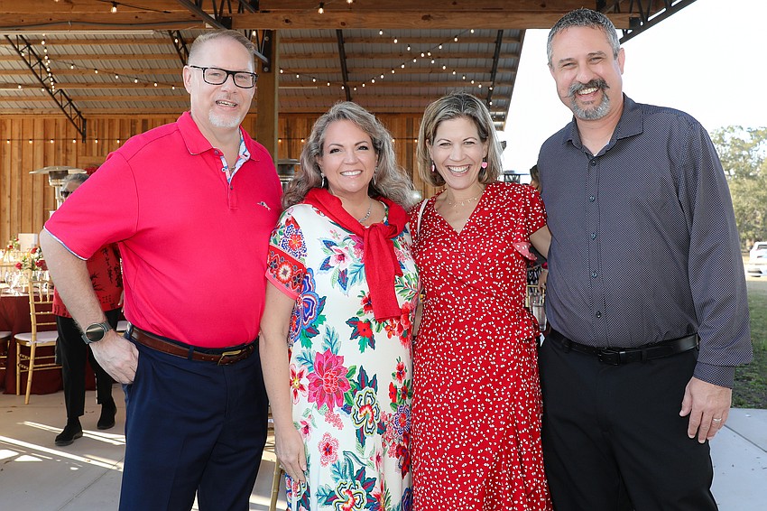 All smiles are Jeremy and Veronica Miller and Kristen and Nick Theisen.