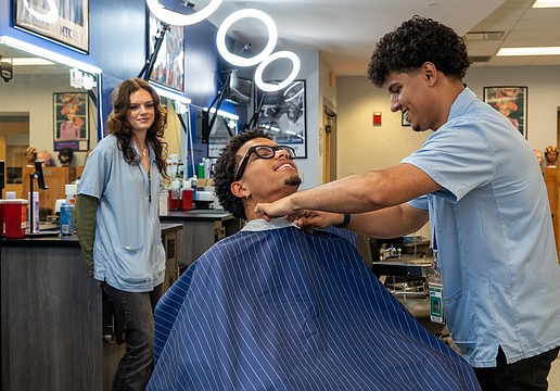 Jessie King, Jadis Hebdon in the chair and Carlos Fuentes