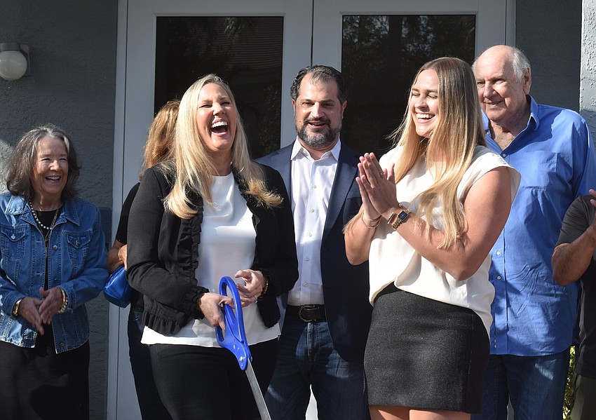 CoworkLWR's Melissa Pandeloglou, Keith Pandeloglou and Madison McNally hosted a ribbon cutting ceremony on Feb. 17 to celebrate the opening of the new and bigger location.