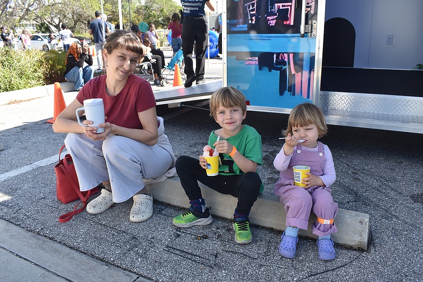 Chelsea March and her kids Arlo March, 5, and Mona March, 2, live in the area and came to check out the school.
