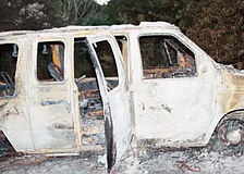 Investigators in 1999 linked the burned-out van found near the
intersection of Myrtle Street and North Orange Avenue in Sarasota to homicide victim Esco Hunter Jr.