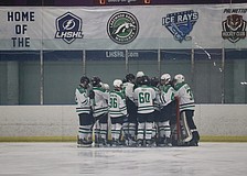 The Lakewood Ranch High School hockey team huddles together at the Ellenton Ice and Sports Complex in December. The team could call Lakewood Ranch home if an ice rink is built at Premier Sports Campus North.