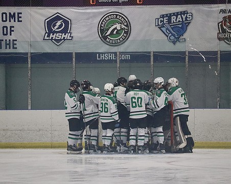 The Lakewood Ranch High School hockey team huddles together at the Ellenton Ice and Sports Complex in December. The team could call Lakewood Ranch home if an ice rink is built at Premier Sports Campus North.