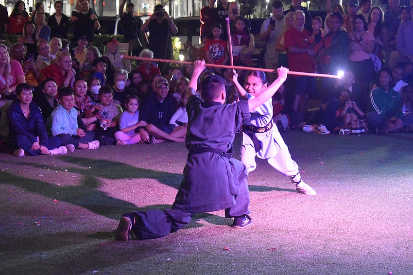 Landon Nguyen, 14, and Mara Cardona, 10, of Mt. Song Martial Arts Academy in Tampa perform Kungfu at the Lunar New Year Celebration.