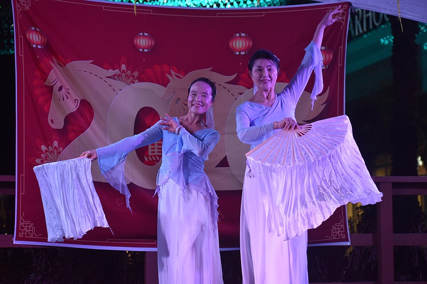 Aiyun Zhu and Zhen Marchica of StarLite Dance Group dance to 