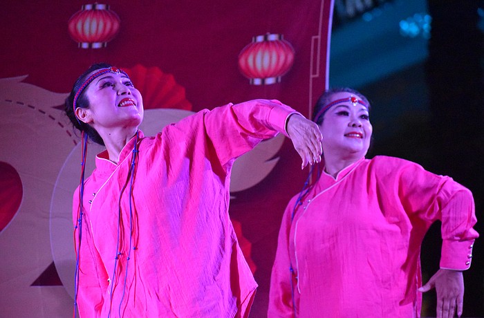 Weizhen Jiang Wolf and Yuhong Wan of Zen Rhythm Dance Group perform a Mongolian Dance at the Lunar New Year Celebration.