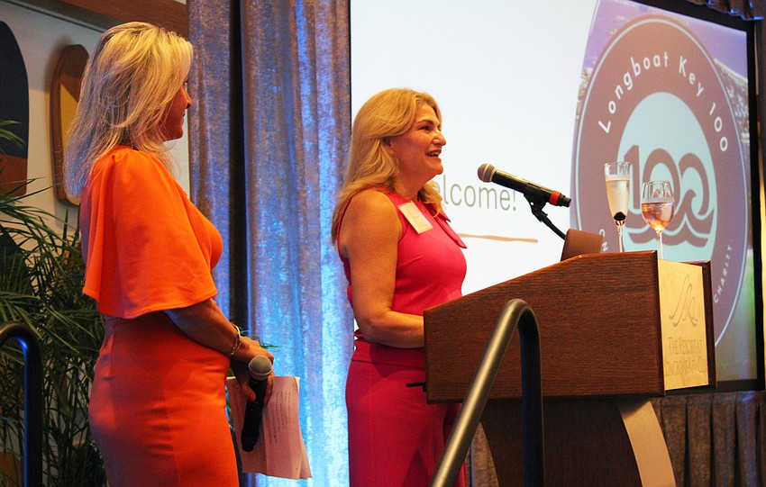 Nicholle DiPinto McKiernan and Michelle Johnson, two of the Longboat Key 100's seven founders, emcee their charitable evening on Feb. 17 at The Resort at Longboat Key Club.