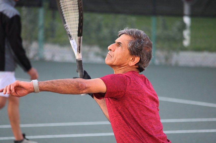 Madhav Mutalik locks eyes on the incoming serve.