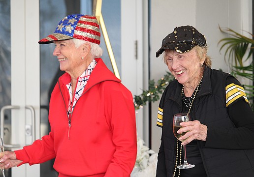 Golfers competing in "Pittsburgh vs. The World" may be rivals out on the green, but at the celebration afterward, they have nothing but smiles for one another. Jan Van Iten and Carol Westwood are the original captains in the friendly tournament, which marked 25 years on Feb. 16.