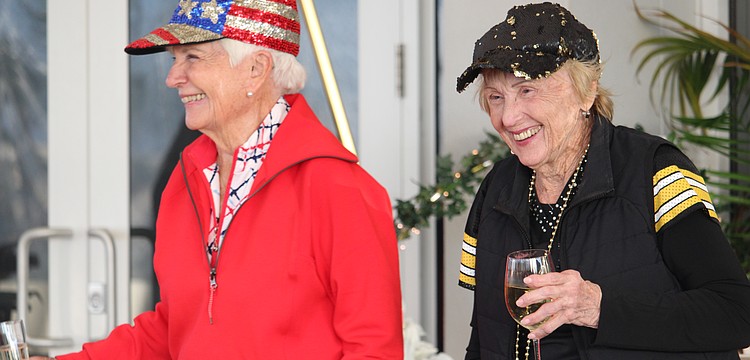 Golfers competing in "Pittsburgh vs. The World" may be rivals out on the green, but at the celebration afterward, they have nothing but smiles for one another. Jan Van Iten and Carol Westwood are the original captains in the friendly tournament, which marked 25 years on Feb. 16.