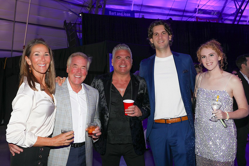 Kris Nystrom, Jim Kraft, John Huskins and Ed and Kylie Pelc