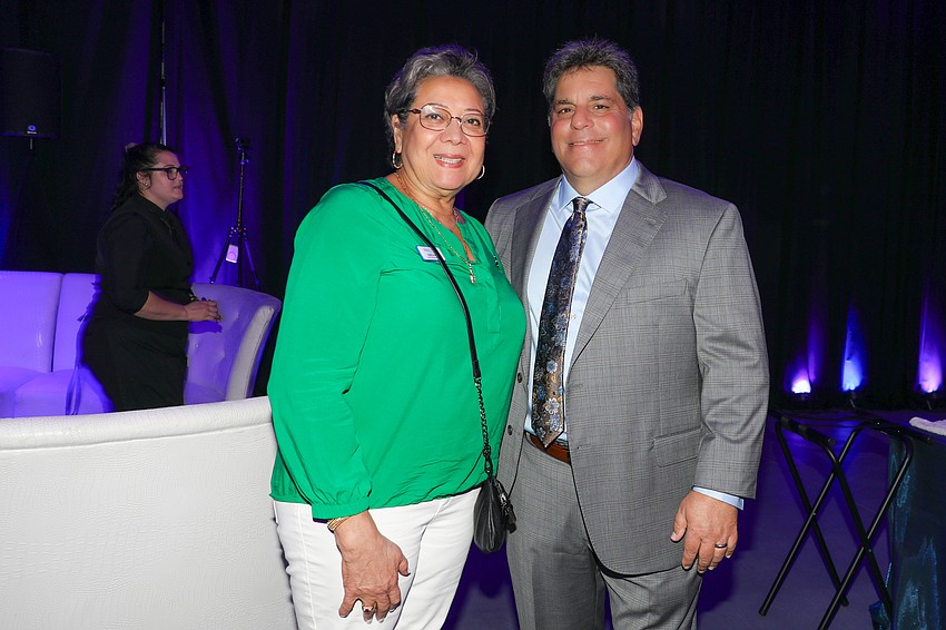 From Make-A-Wish are Karen Mullins and Stu Opperman.