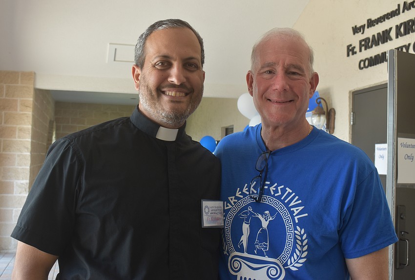 Rev. Fr. Kyriakos Hambos and Nick Rantis, the chairperson of the St. Barbara 42nd Annual Greek Festival, are glad so many are able to attend and embrace food, faith and people of Greek culture.
