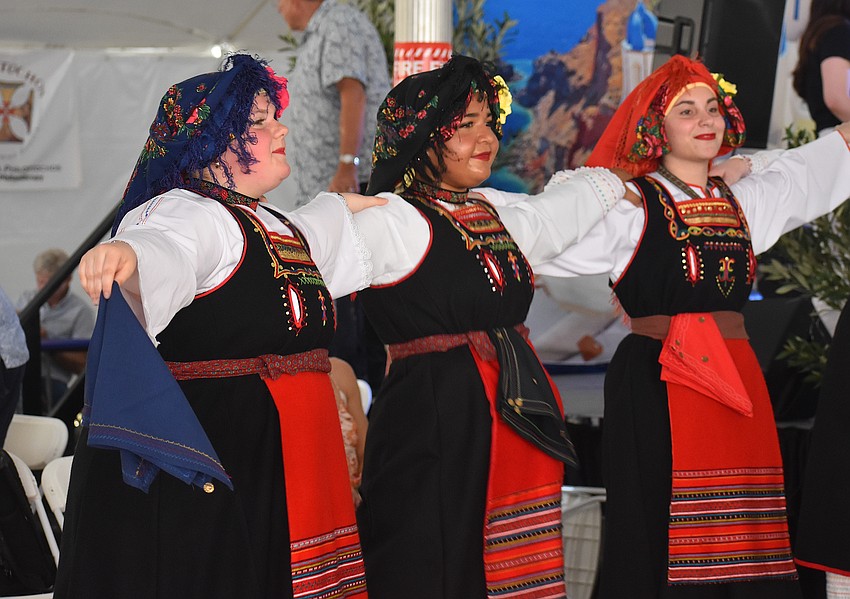 Paulina Whyte, Melyna Stylianoudakis and Anna Maria Antony perform as part of the St. Barbara's Hellenic Folk Dance Group at the St. Barbara 42nd Annual Greek Festival.