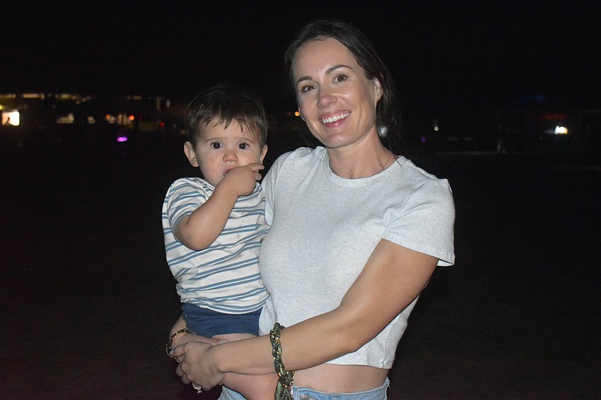 Elliott Alexander, 15 months, and his mom Kayla are happy attend the Lakewood Ranch Community Campout among family and friends.