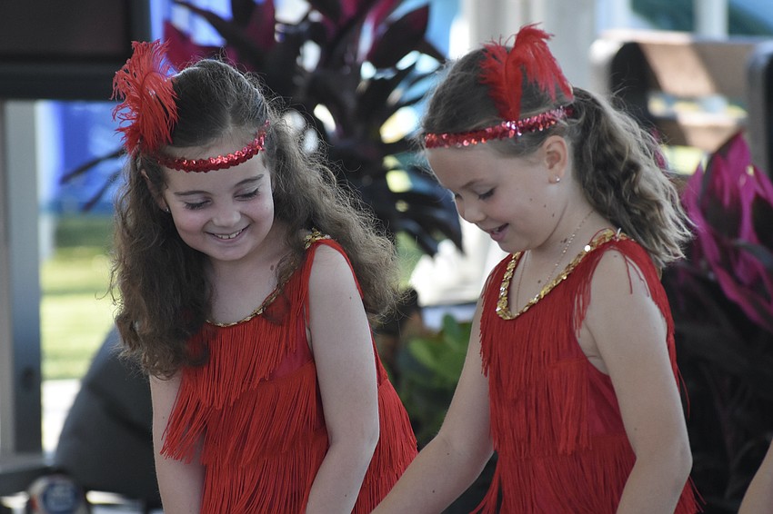 Second graders Amelia Johnson and Vera Bische dance the Charleston with the Bay Haven Broadway Club.