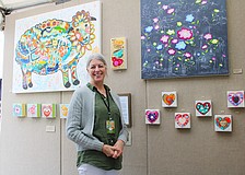 Artist Kathleen Murphy Willer, based in Menomonee Falls, Wisconsin, said she has fun incorporating elements evocative of childhood in her acrylic paintings. She was one of the artists to brave the sun and rain at last weekend's fine art festival on Longboat Key.