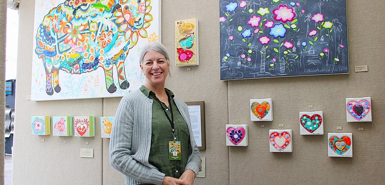 Artist Kathleen Murphy Willer, based in Menomonee Falls, Wisconsin, said she has fun incorporating elements evocative of childhood in her acrylic paintings. She was one of the artists to brave the sun and rain at last weekend's fine art festival on Longboat Key.