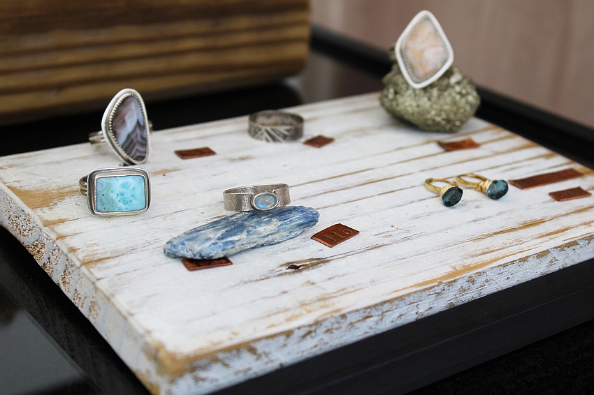 Jewelry artist Vita Qualls of Craevita Jewelry said her style focuses on letting the uniqueness of the stones in her work shine with delicate metalwork framing them.