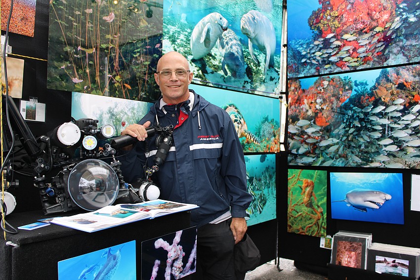 Last weekend was the first time underwater photographer Mark Kosarin had a booth at the Longboat Key festival of the arts, and he took the opportunity to show visitors the camera equipment he uses to capture the vibrant images.