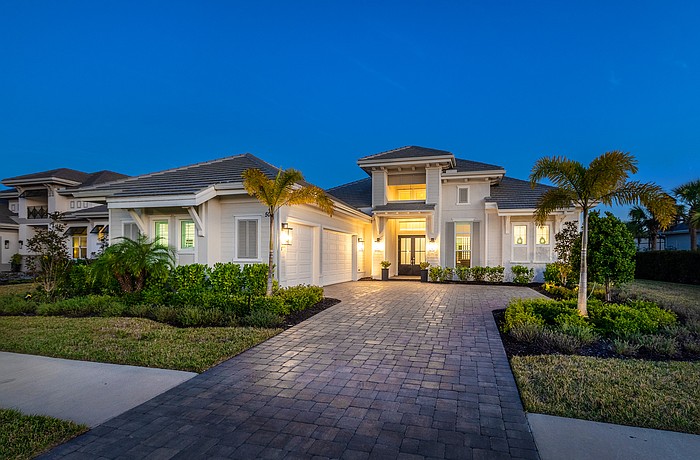 This Wild Blue at Waterside home at 508 Blue Shell Loop sold for $2.4
million. Built in 2024, it has three bedrooms, four-and-a-half baths, a pool and 3,028 square feet of living area.