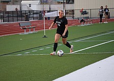 Senior forward/defender Rheanne Fleming looks for a pass during the FHSAA Class 6A-Region 3 championship Feb. 17 between Lakewood Ranch and East Lake. It proved to be the Mustangs' final win of 2025-26.