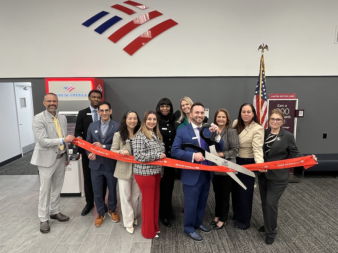 Bank of America leadership cut the ribbon at the newly renovated Gulf Gate branch.