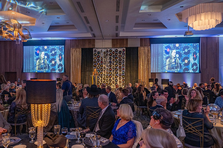 The program begins with COO Alison Thomas speaking.