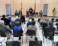 Residents and community members listen to opening remarks by the finalist candidates for Sarasota city manager.