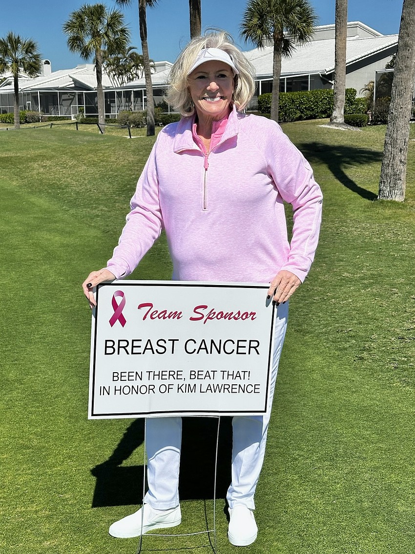 Golfer Kim Lawrence celebrated victory with her team at the Swing for the Cure annual golf day on Feb. 24. Lawrence is a cancer survivor, and proceeds from the day benefit Breast Health Sarasota, Inc.