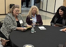 From left, Karie Friling speaks with Commissioner Jen Ahearn-Koch and Argus Foundation CEO Christine Robinson during a Feb. 23 open house event to meet the city manager finalists.