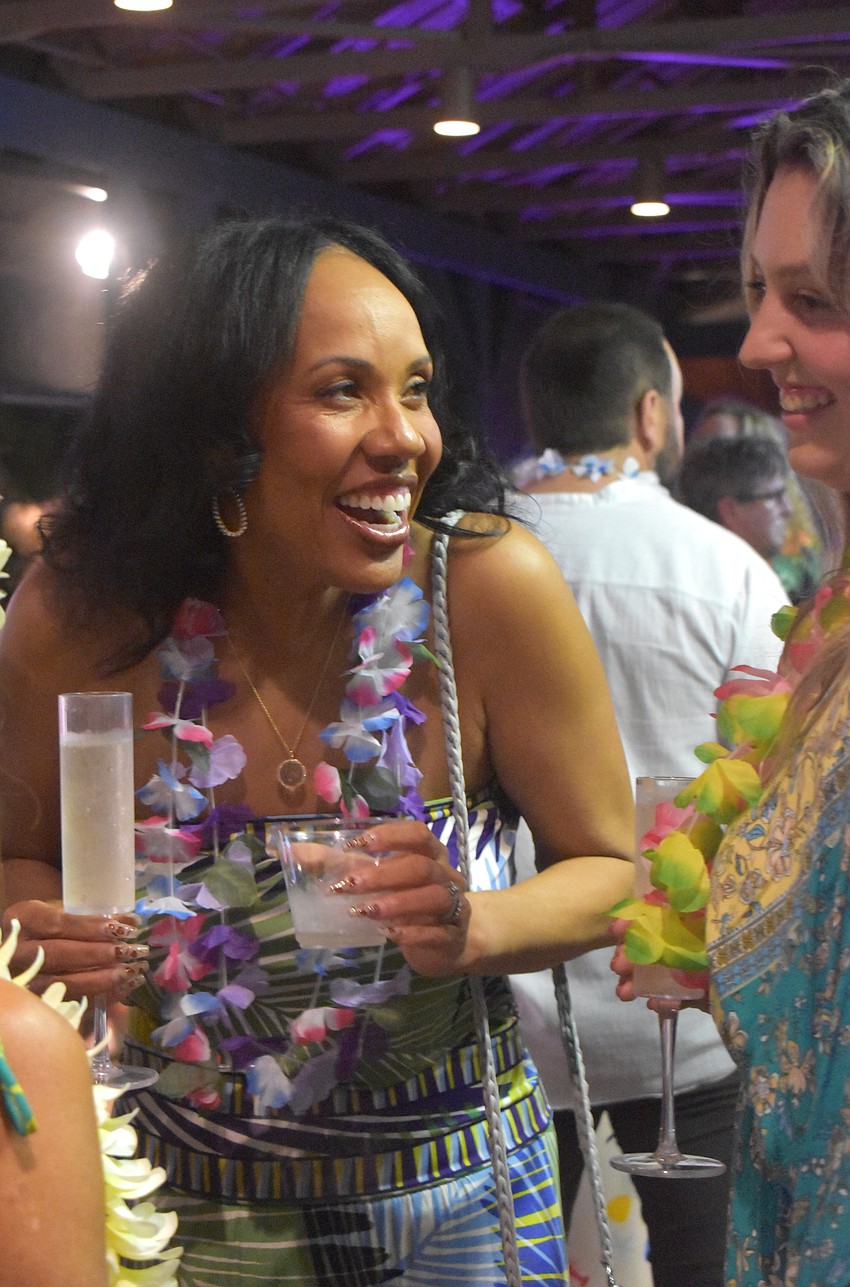 Briana Francois and Katelinn Wurm socialize during the cocktail hour at Tropical Escape at the Sarasota Polo Club.
