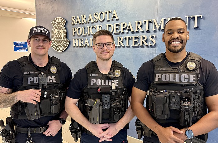 From left, SPD officers Anthony Zappone, Nick Bernier and Daniel Stevens were the first responders to a house fire on Feb. 20.
