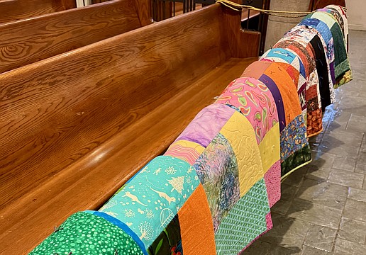 Church of the Redeemer volunteers hand made 30 quilts to accompany 30 beds donated and assembled by the church for children at Alta Vista Elementary School.