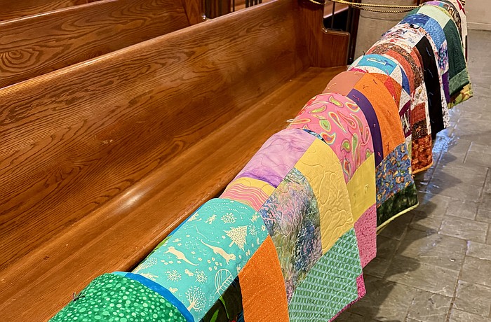 Church of the Redeemer volunteers hand made 30 quilts to accompany 30 beds donated and assembled by the church for children at Alta Vista Elementary School.