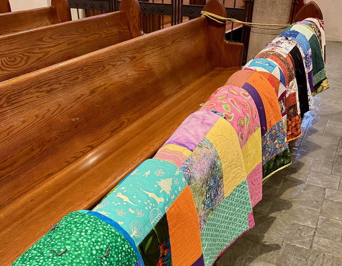 Church of the Redeemer volunteers hand made 30 quilts to accompany 30 beds donated and assembled by the church for children at Alta Vista Elementary School.