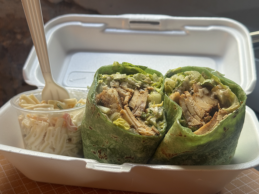 Southside Deli's chicken Caesar wrap with blackened chicken ($11.95) and a side of macaroni salad.