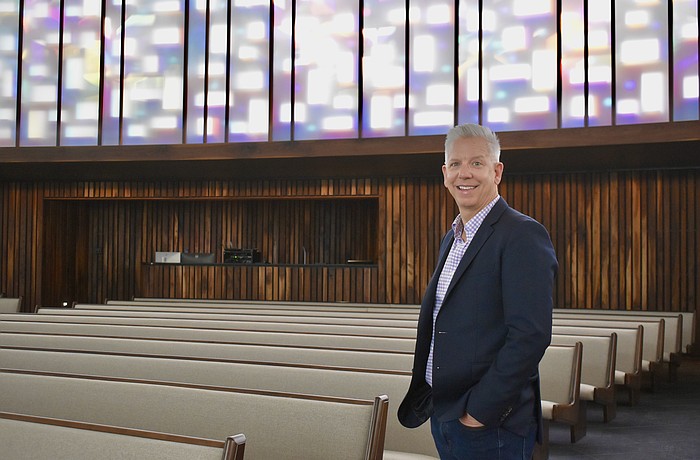 Rev. Phil Woods stands in the newly renovated 10,000-square-foot sanctuary.