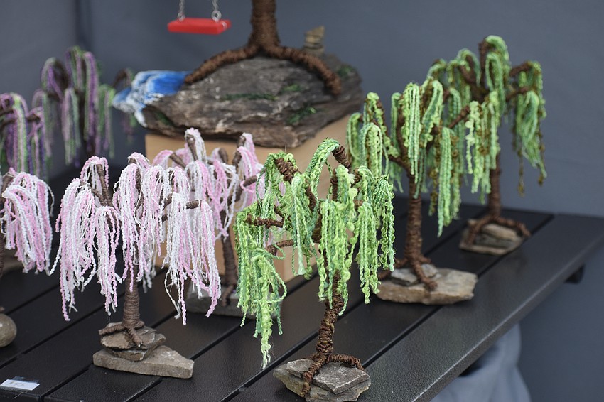 Trees from Carol Gingrich Designs are on display.