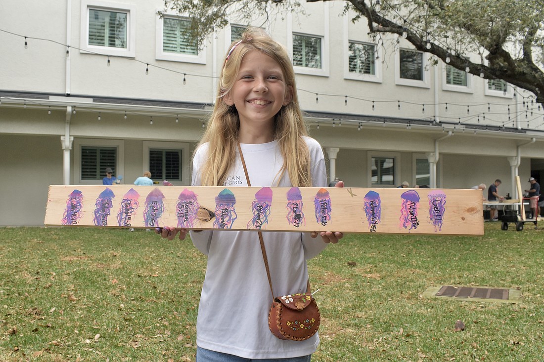 Magnolia Riner, 10, displays a design she created.