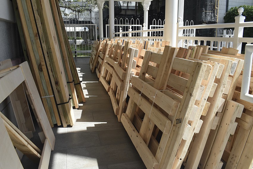 Finished components of the bed are stacked, ready for distribution.