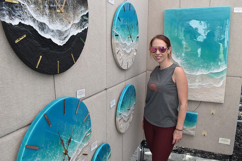 Rachel Wu of Crafted by Rachel poses with her resin artwork.
